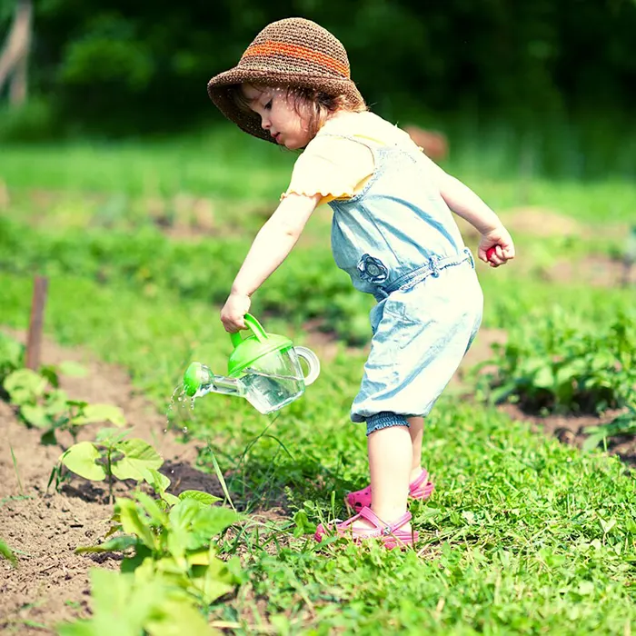 child-with-plant